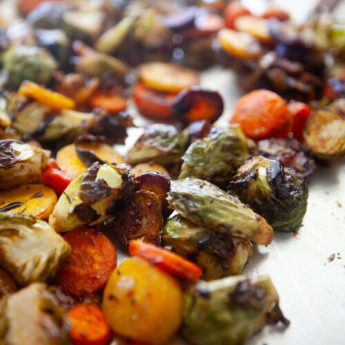 Roasted fall veggies on baking dish.