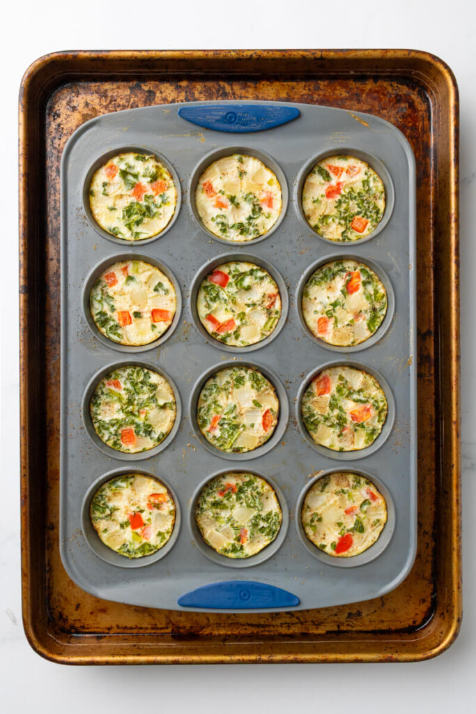 Egg white cups baked in silicone mold on baking tray water bath.