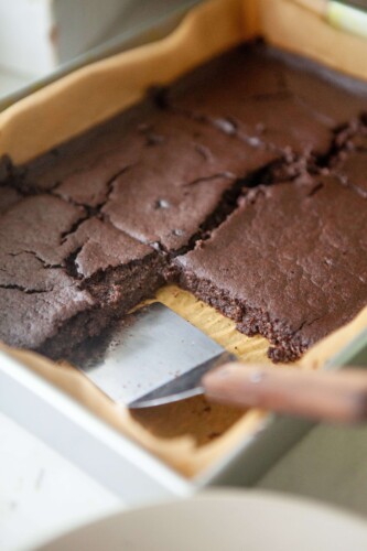 Chocolate protein breakfast bars cut in a 9x13 dish.