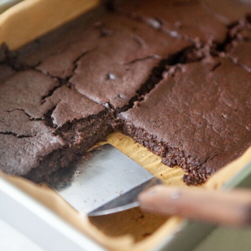Chocolate protein breakfast bars cut in a 9x13 dish.