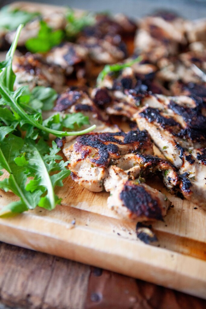 Chicken thighs marinated in fresh herbs and grilled.