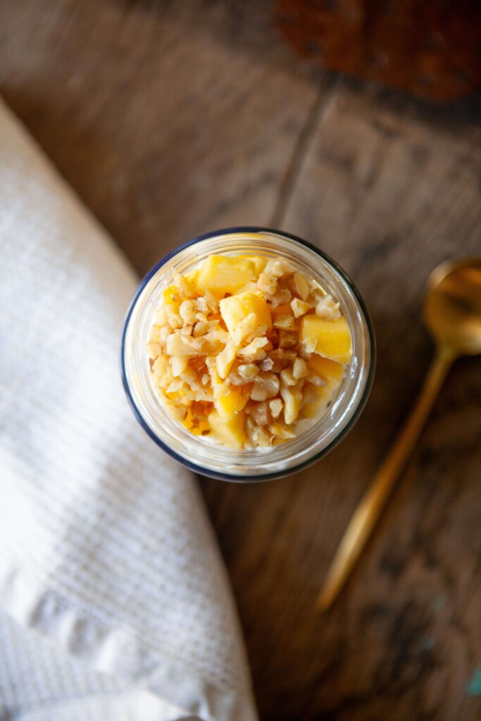 Overnight oats topped with fresh mango and walnuts.